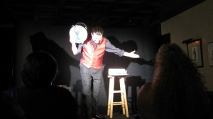Magician John Shore waits for the applause to die down at the end of an exclusive peice of magic at the Kentucky Magic Dinner Theater